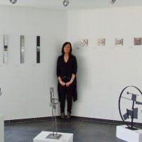 EMG in a corner of her ‘Intimists’ exhibition with sculptures by Olivier Jean Caloin, mediArt espace Gallery, 31 Grand-rue, Luxembourg City.